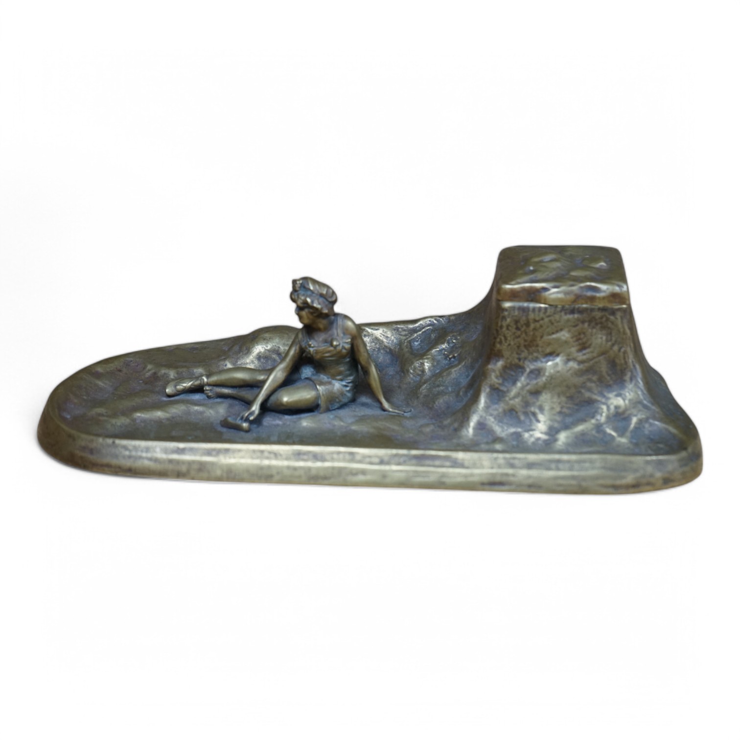 An Art Nouveau bronze ‘bathing lady’ inkwell, 26cm wide. Condition - good